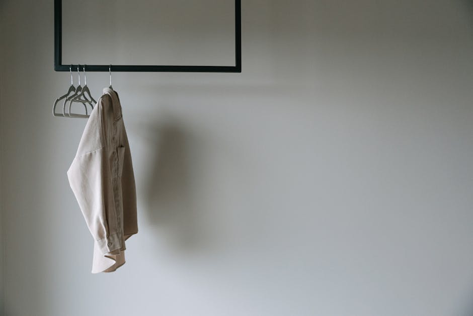 clothing rack with minimalist neutral clothes
