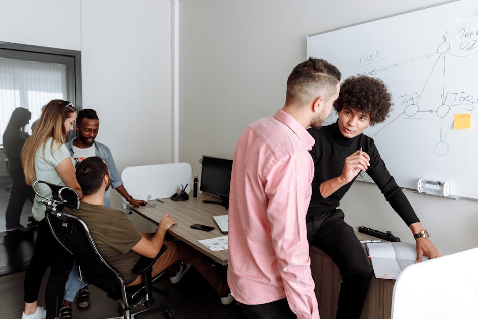 Diverse team discussing AI application in office