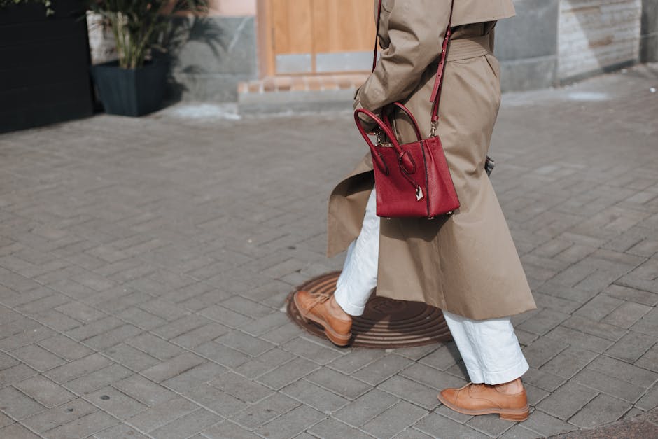 elegant woman walking with classic leather handbag