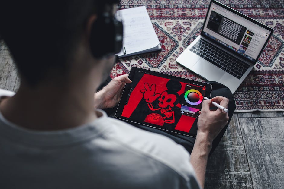 graphic designer working on tablet with AI assistance
