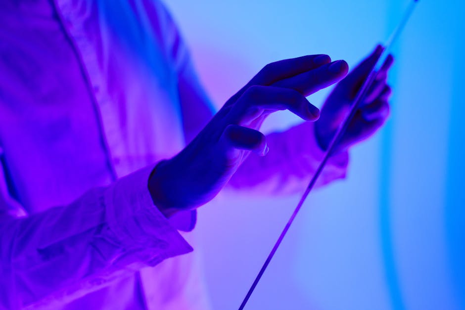 hands interacting with a holographic interface