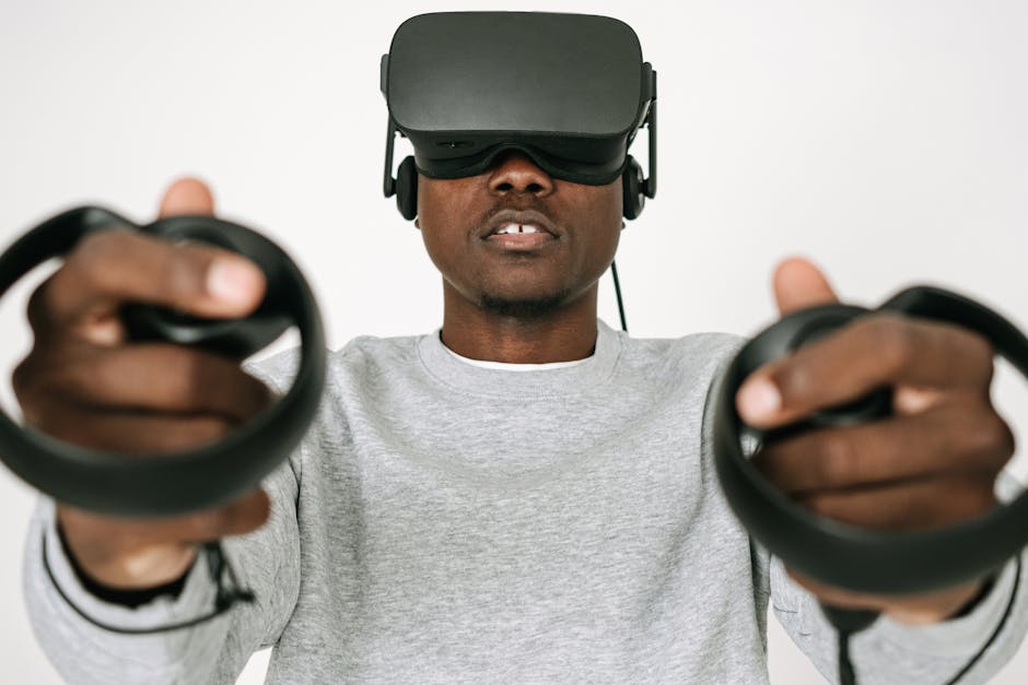 man wearing vr headset coding