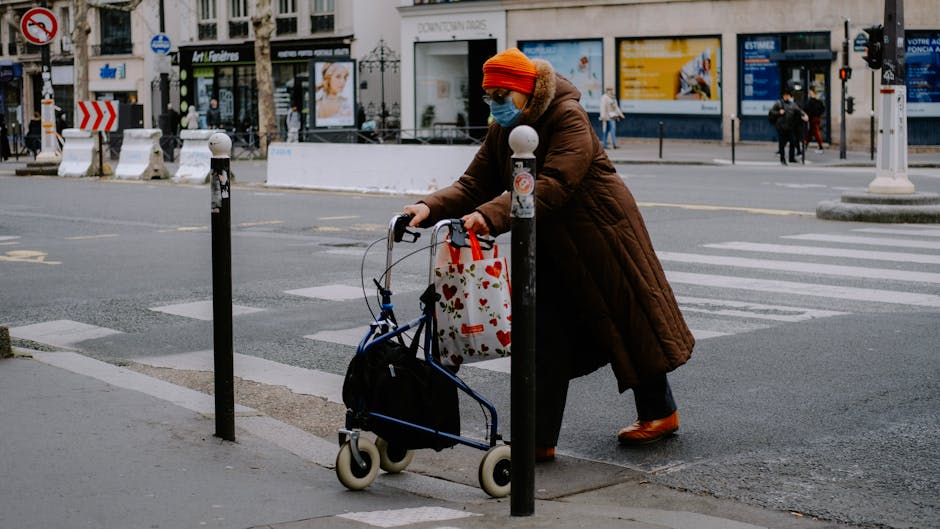 minimalist chic french woman walking in paris