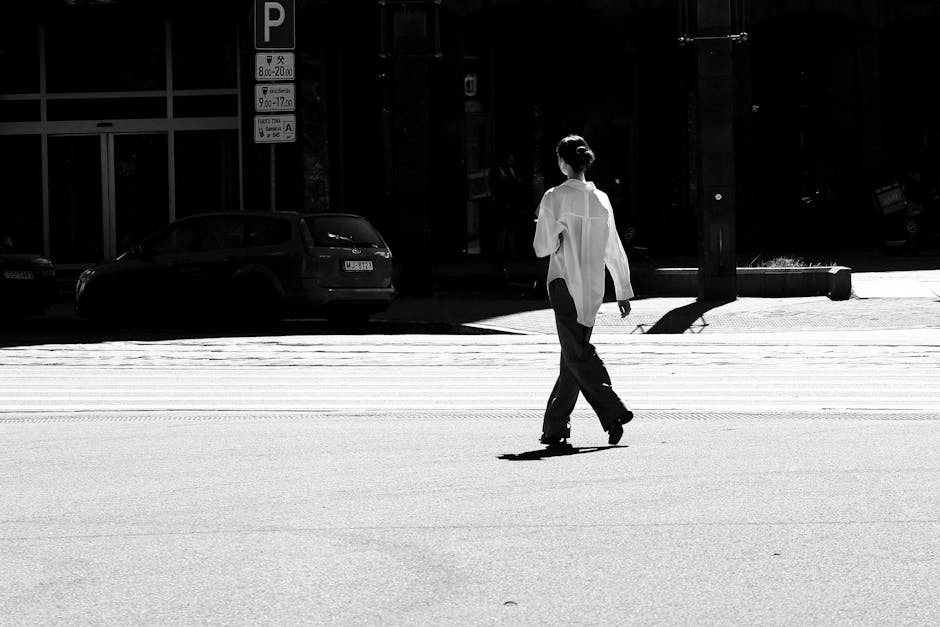 minimalist fashion woman walking city street