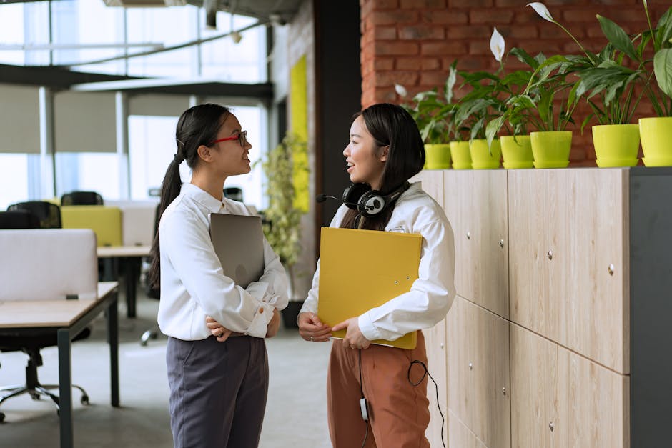 modern office workers discussing fashion