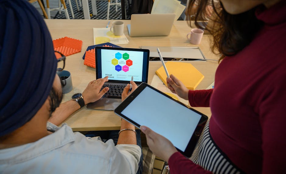 people collaborating in modern office with digital tools