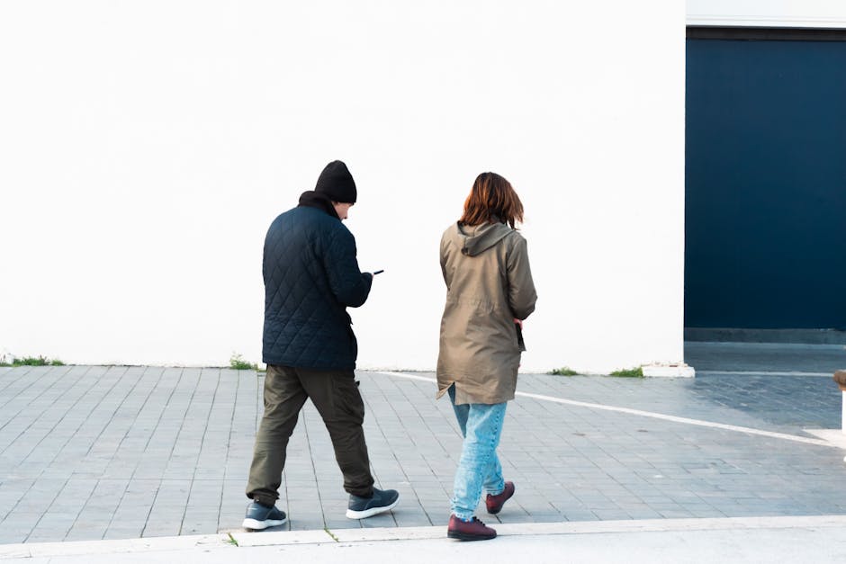 people walking city street neutral colors