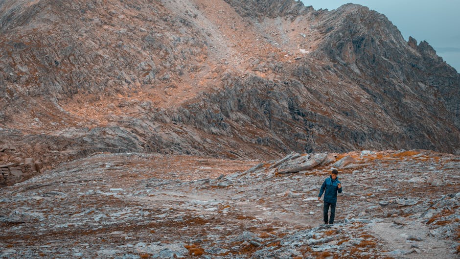 person hiking in mountains