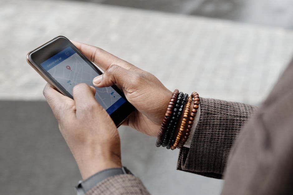 person using smartphone to navigate in city