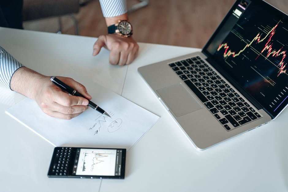 person writing on laptop with AI graphs