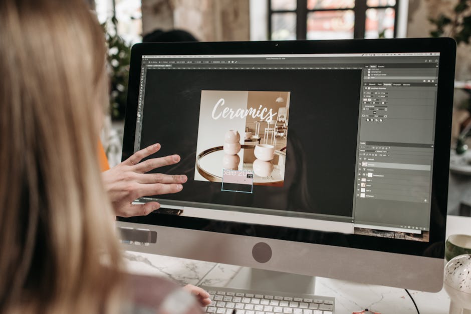 Woman designing graphics on computer