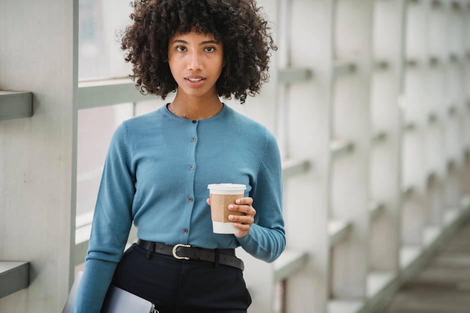 woman drinking coffee in stylish casual outfit
