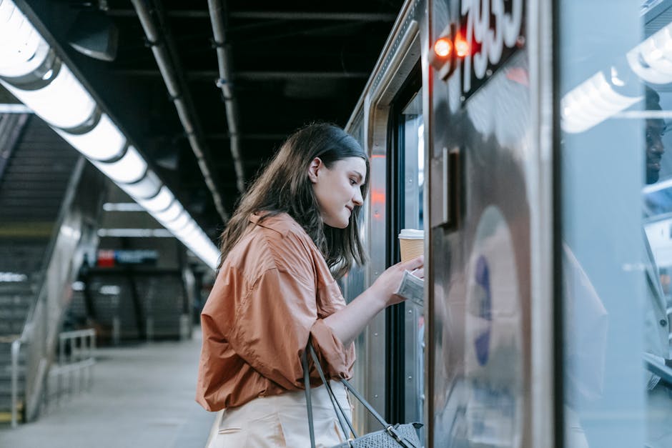 Woman enjoying coffee on a train journey