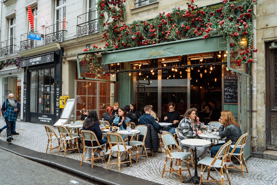 woman enjoying coffee on Paris cafe terrace