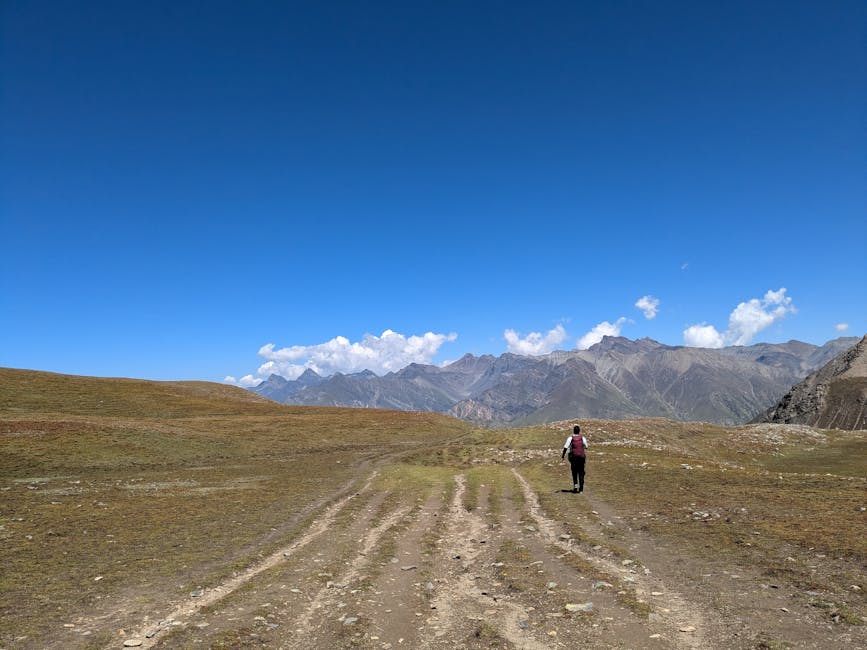 woman hiking in mountains alone