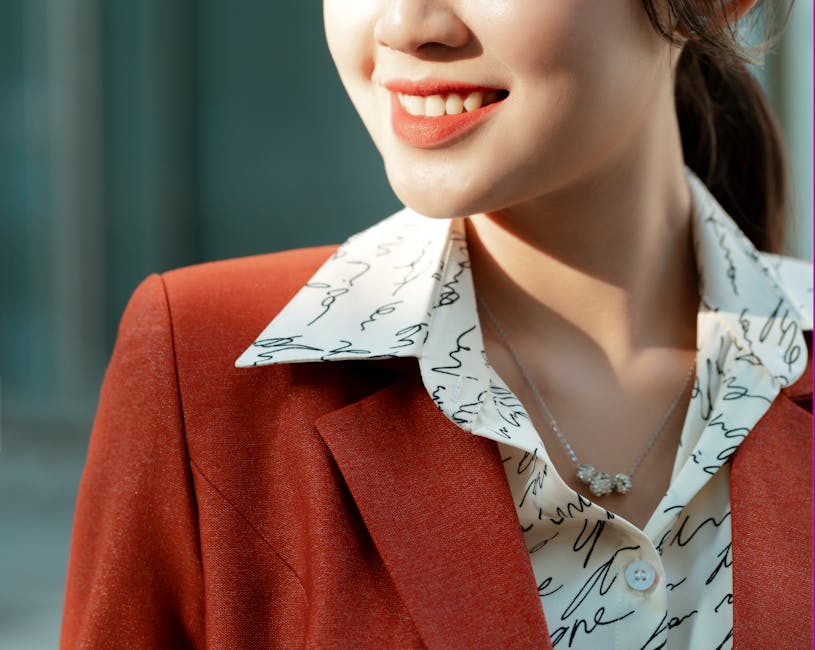 woman smiling in elegant blazer