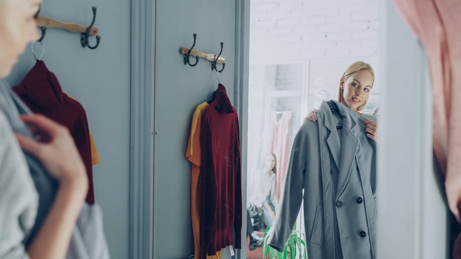 Woman trying on clothes in a well-lit fashion store