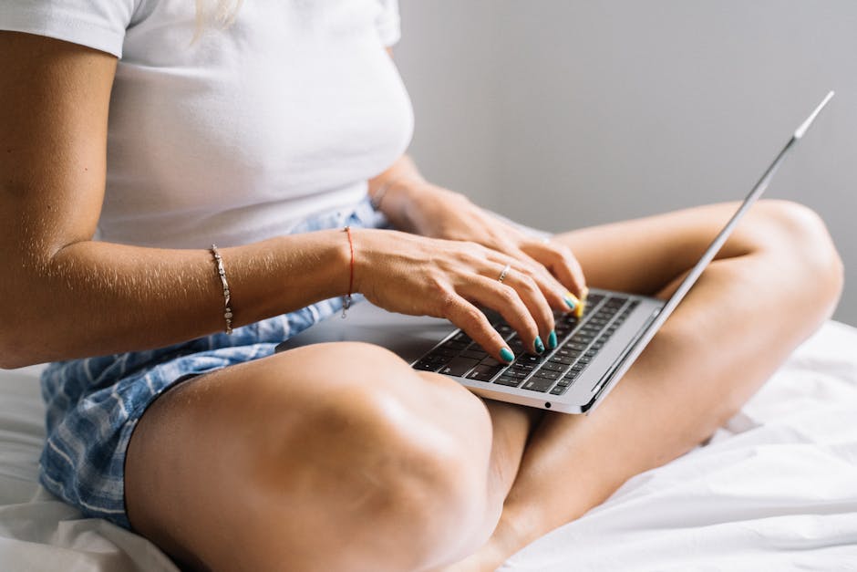 woman using AI text generator on laptop