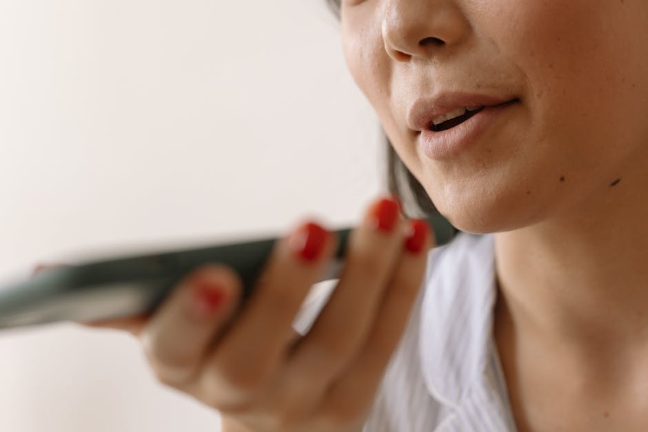 woman using voice assistant to schedule meeting