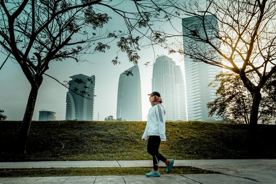 woman walking in city park