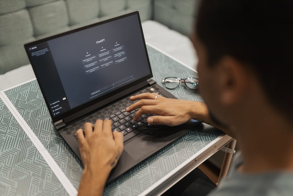 woman working on laptop with AI assistant