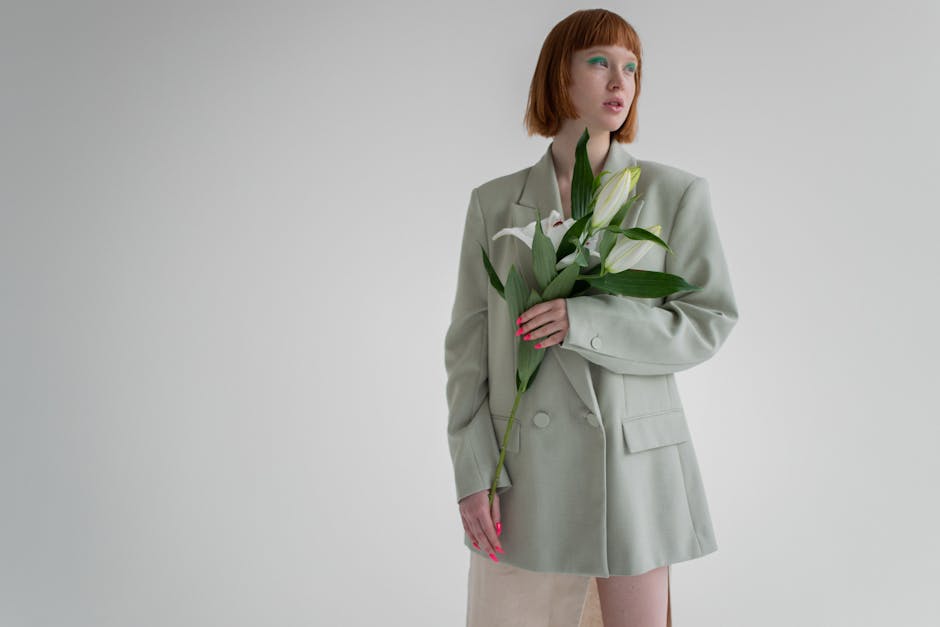 young woman oversized blazer sneakers