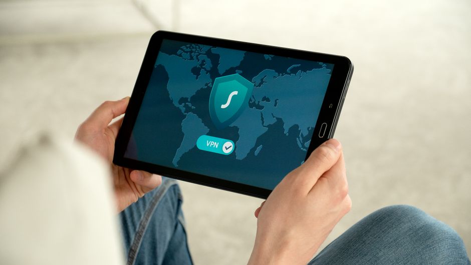 A simplified diagram illustrating how a VPN encrypts internet traffic and routes it through a server, showing the path from a device to the internet with and without VPN protection.