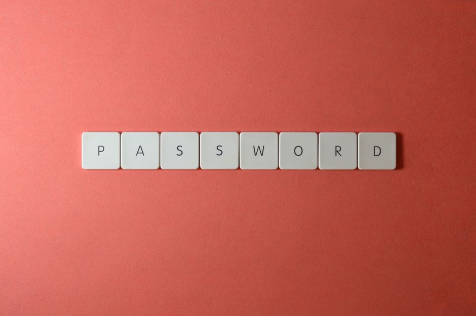 A graphic representation of a digital padlock securing a collection of unique, randomly generated passwords, emphasizing account security.
