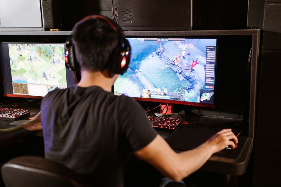 A close-up of a gaming monitor displaying a fast-paced action scene, highlighting fluid motion.