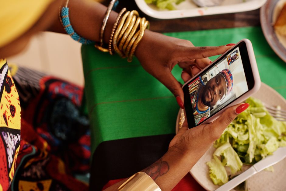 A diverse group of people engaged in clear, lag-free video calls on various devices, emphasizing the benefits of good VPN speed for communication.