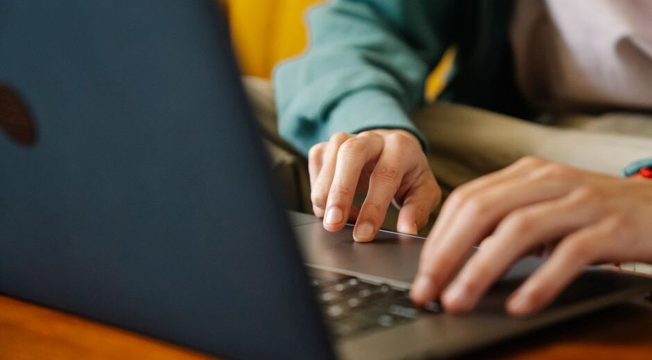 A person at a laptop comparing product specifications and prices from multiple online retailers, highlighting the decision-making process for useful everyday products.