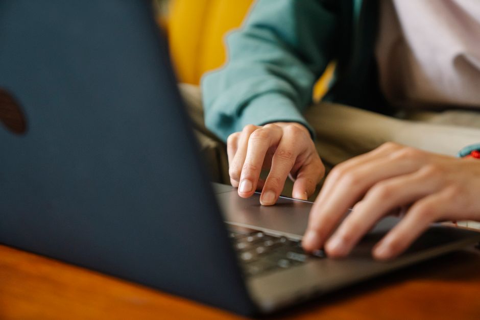 A person at a laptop comparing product specifications and prices from multiple online retailers, highlighting the decision-making process for useful everyday products.