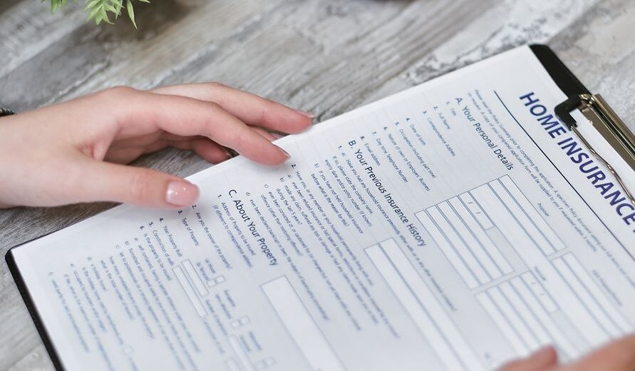 A person studying a detailed privacy policy document on a tablet with a cup of coffee nearby, emphasizing careful review.