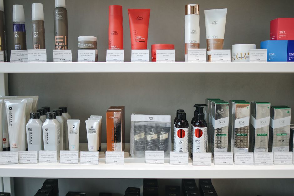 A well-organized shelf displaying a variety of affordable skincare products from popular brands like CeraVe, The Ordinary, and La Roche-Posay, emphasizing accessibility.